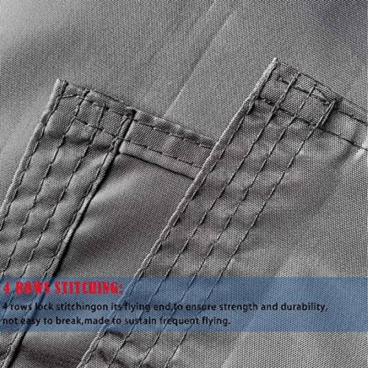 Black embroidered flag fabric with visible stitched seam and rope-style border detail.