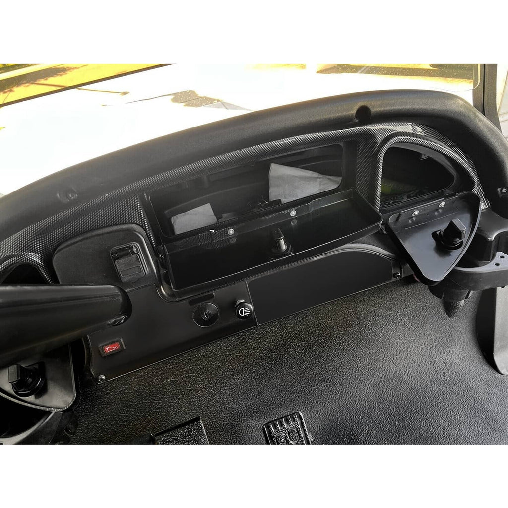 Installed dash locking door with carbon-fiber-look trim and open storage compartment