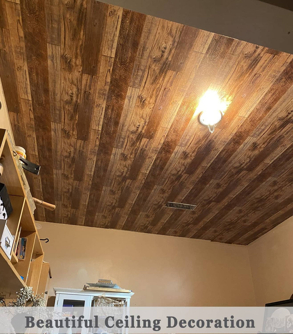 Faux wood wallpaper covering a slanted ceiling, warm brown plank pattern