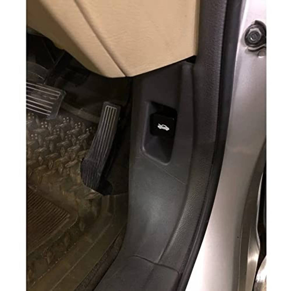 Black hood release latch handle cover installed on vehicle latch area.