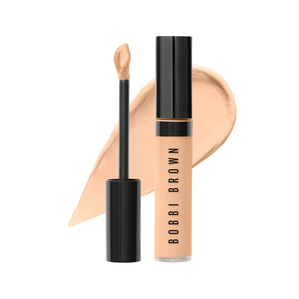 Bobbi Brown concealer in Sand with sponge-tip wand in clear bottle