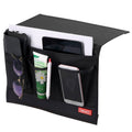 Black bedside storage organizer with front pockets and mesh panels