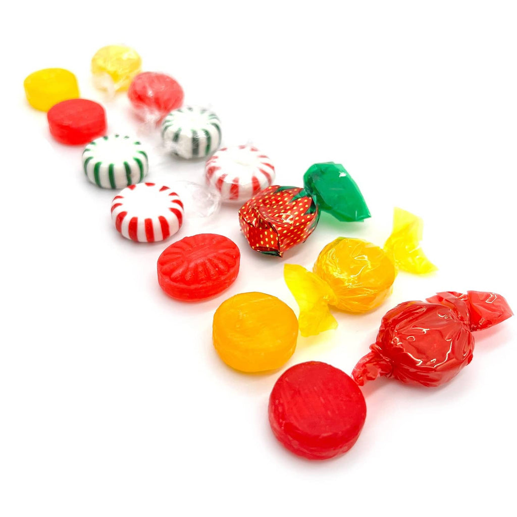 Assorted hard candies wrapped in red, yellow, and green, including striped peppermint