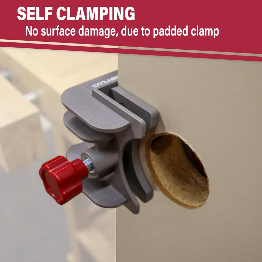 Self-clamping door lock jig with padded clamp holding a wooden panel