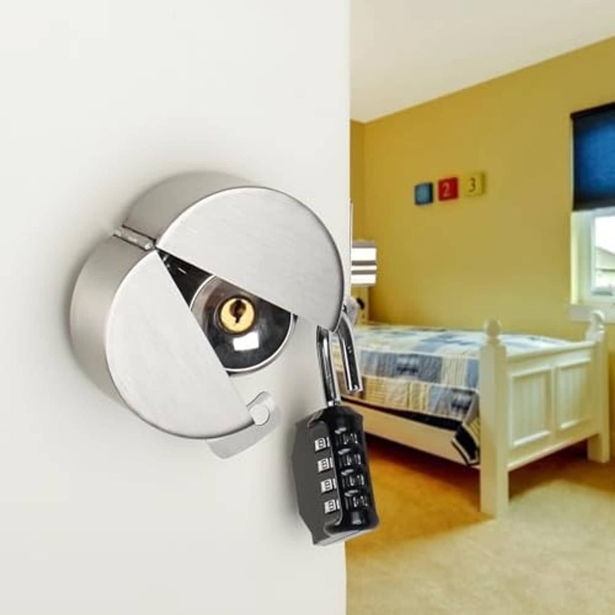 Door knob lock with large round metal cover and black keypad hanging on door