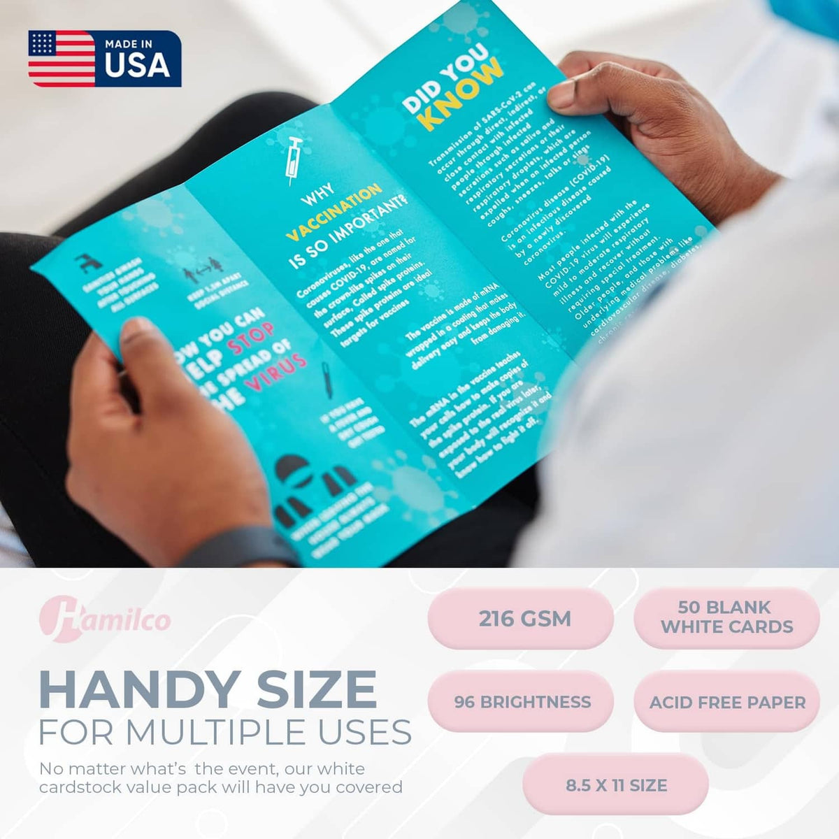 Hand holding a blue printed cardstock sheet