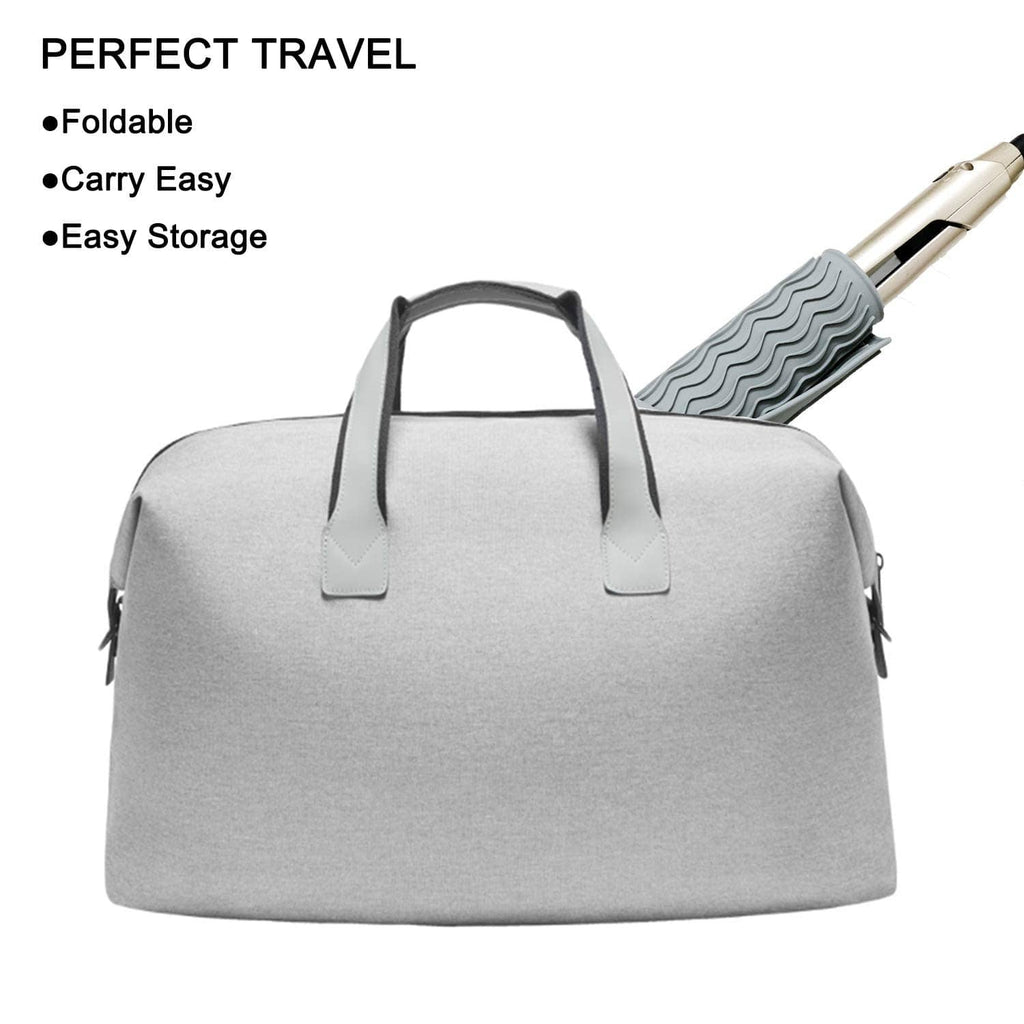 Gray heat mat with wavy ridges inside a foldable carry bag for travel