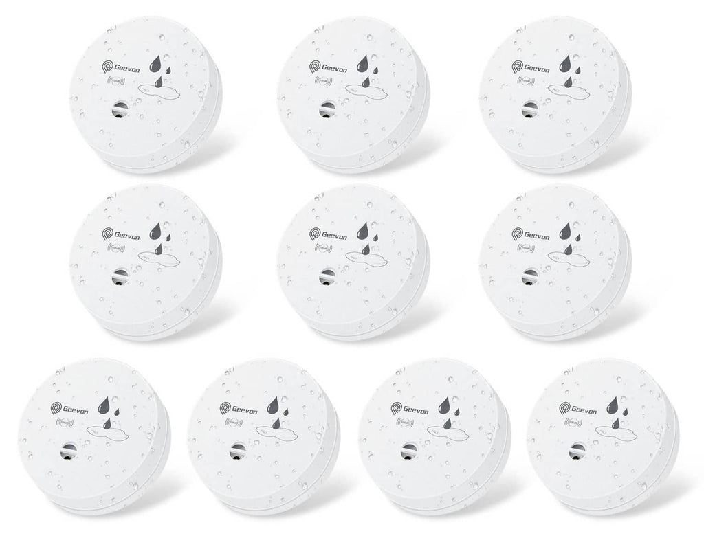 White round water leak detector alarm, showing underside speaker and sensor vent