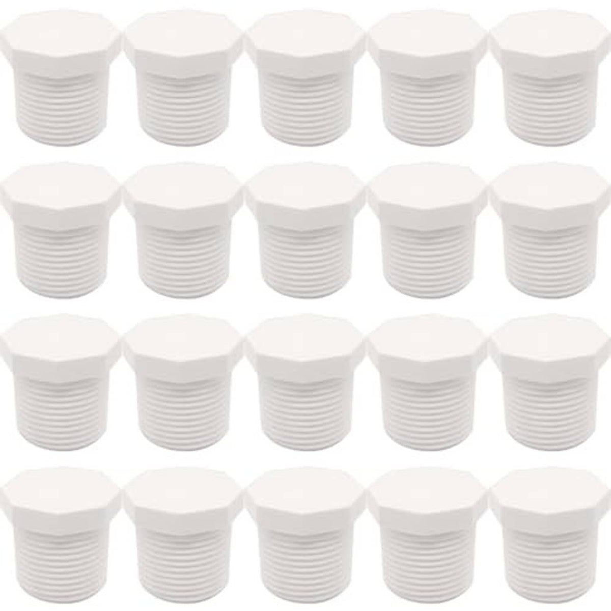 Multiple white PVC male end cap plugs with hex tops and concentric thread ridges