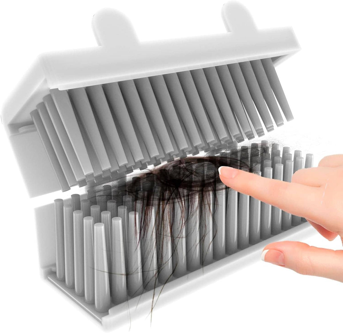 Reusable shower wall hair catcher with white comb bristles trapping dark hair