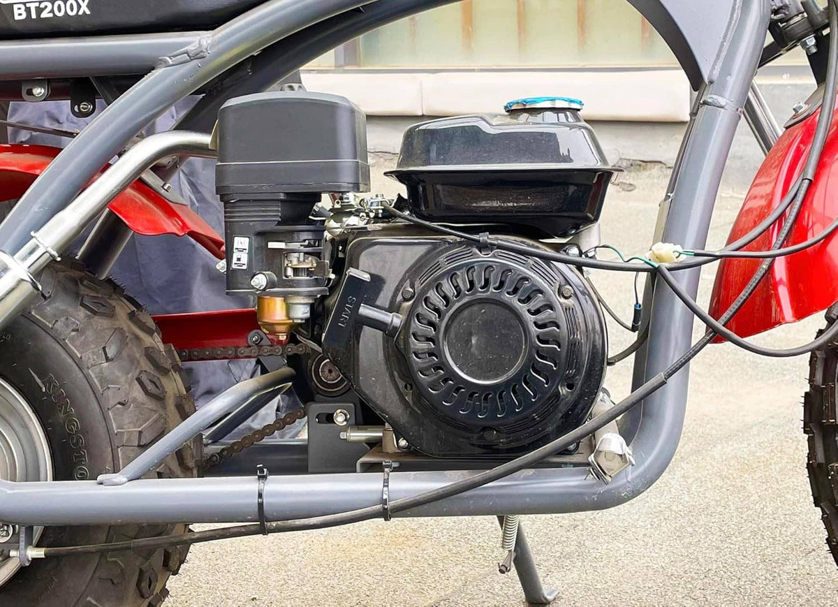 Recoil pull starter installed on small gas engine mounted on vehicle frame