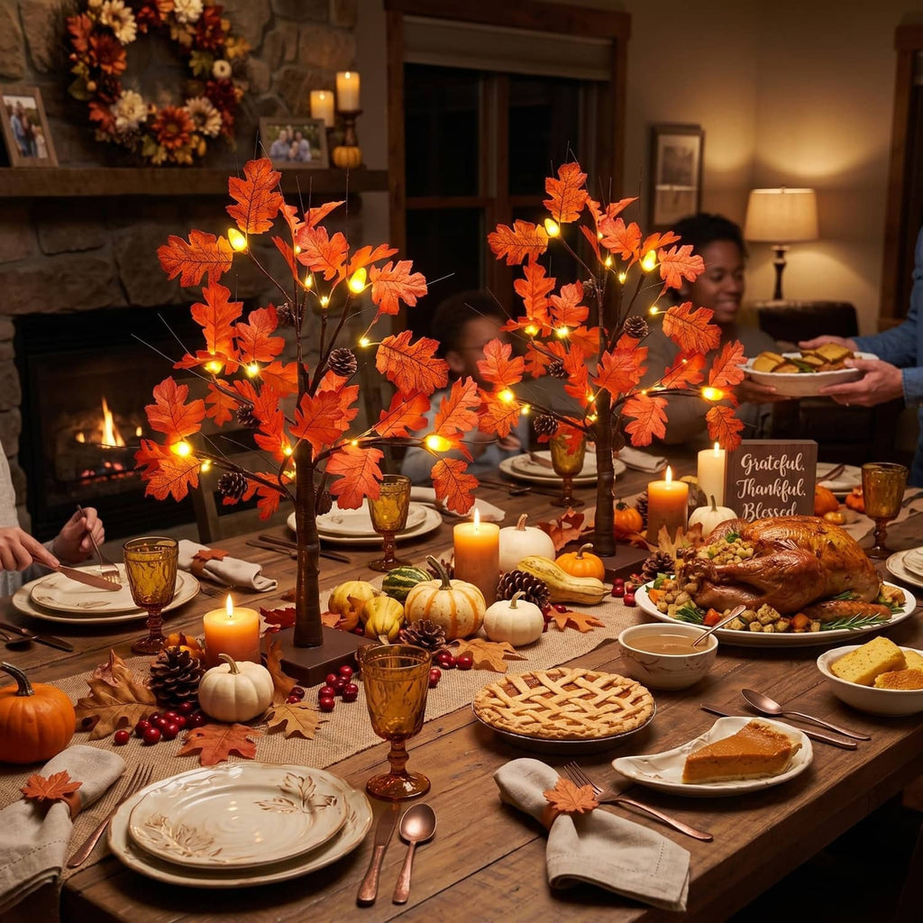 Lighted fall acorn tree decorations with orange leaf lights in an autumn dinner scene