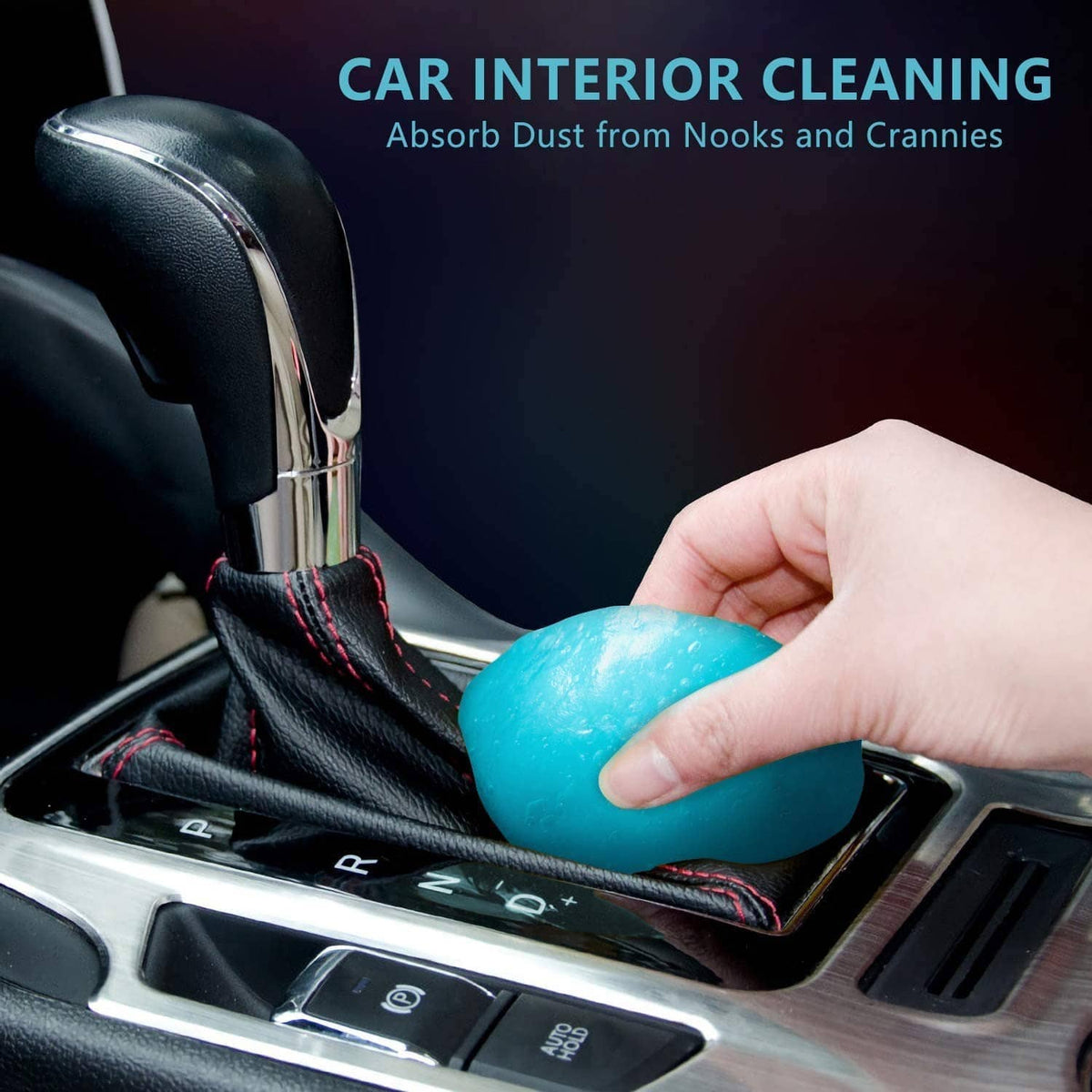 Blue cleaning gel putty pressed on car interior console and gear area