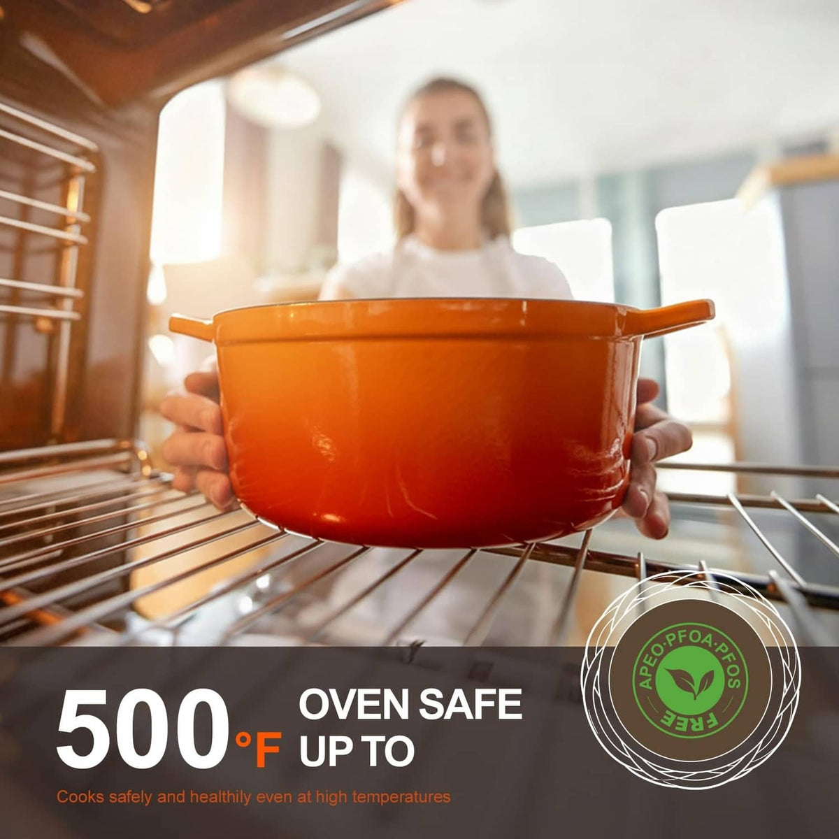 Orange enameled Dutch oven held near oven rack, domed lid and side handles