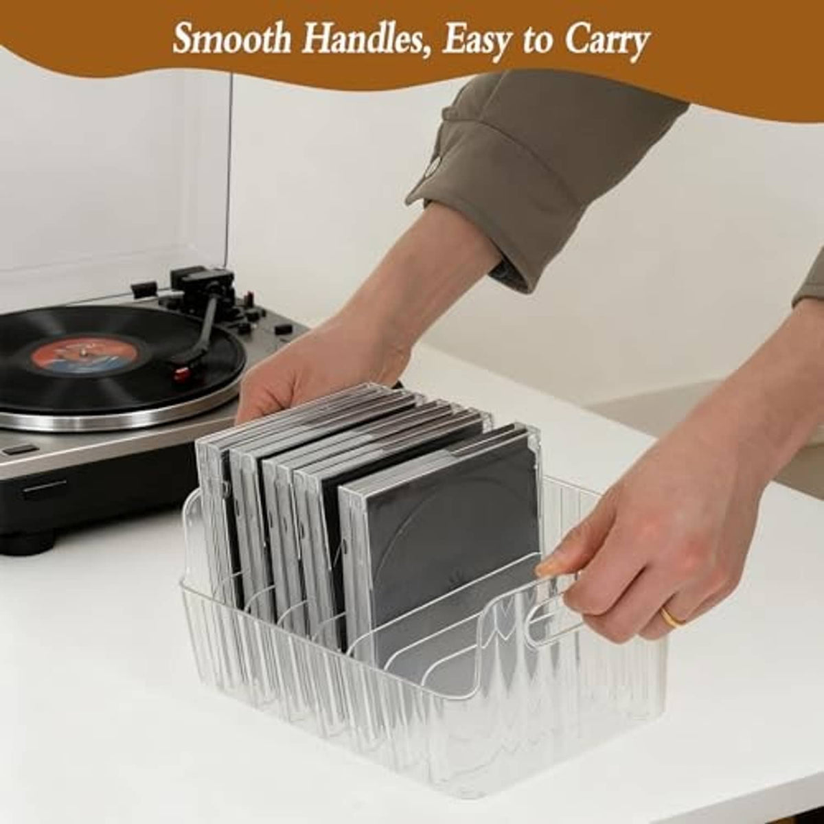 Clear acrylic CD holder rack with smooth carry handle, 3-pack holding CDs