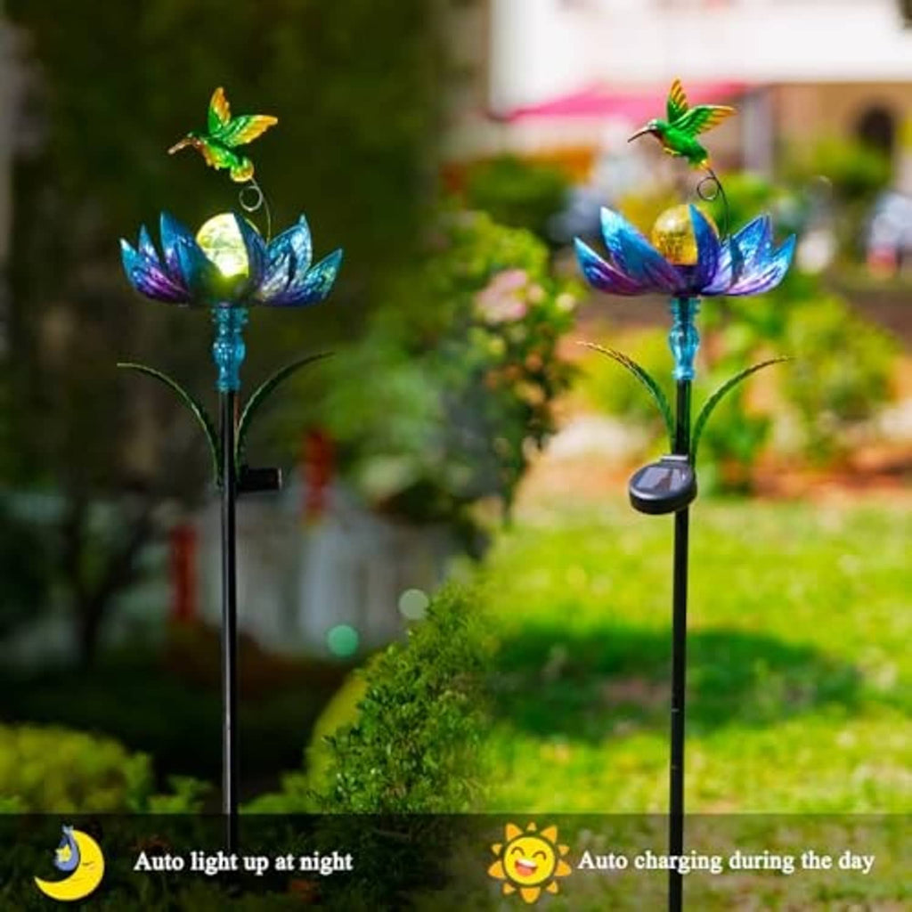 Solar wind spinner set of two with green hummingbirds and blue-purple flowers on stakes