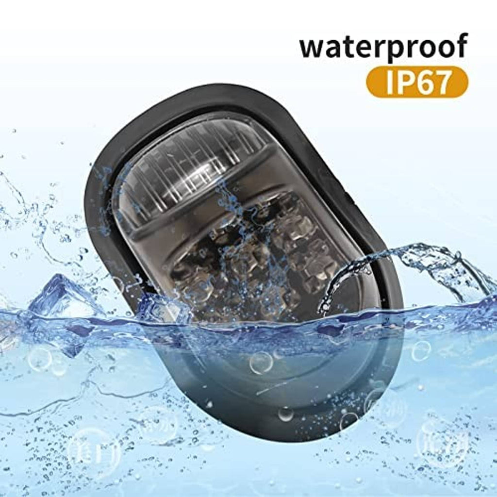 Waterproof amber LED motorcycle turn signal with black housing and clear lens face