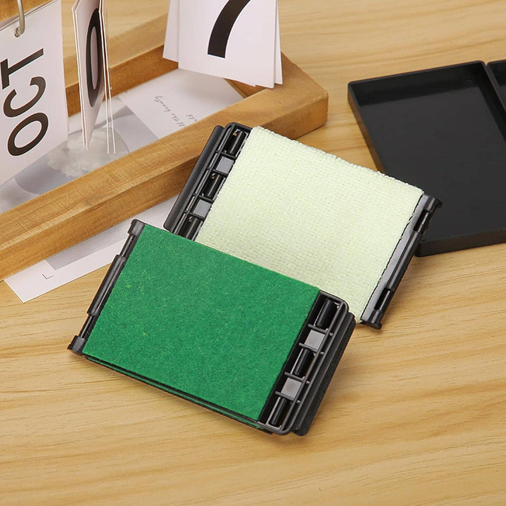 Guitar fretboard cloth cleaner tool with green and white pads in a black case