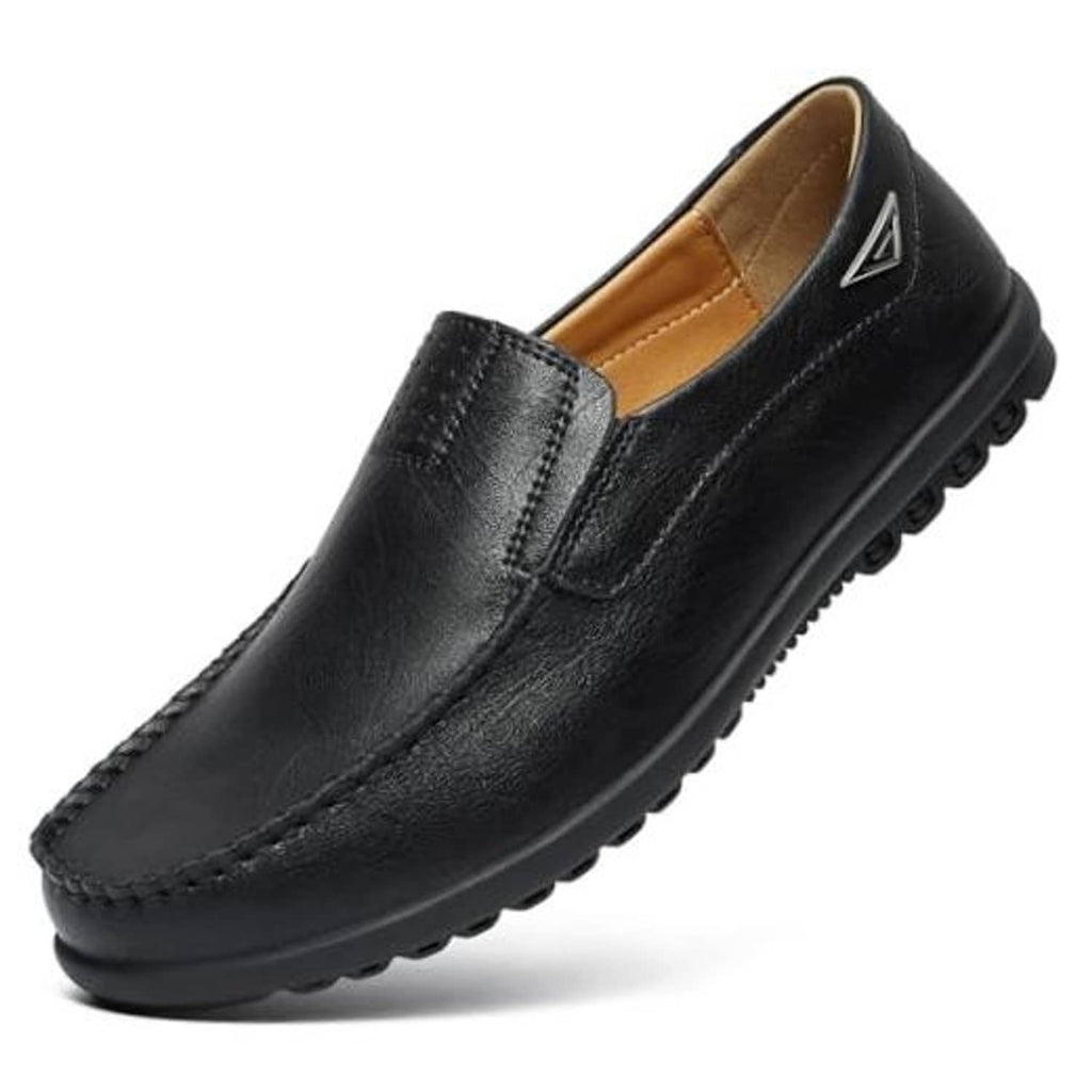 Black slip-on leather loafers with decorative stitching and low-profile rubber sole