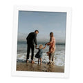 White 8x10 picture frame with clear glass front and solid wood border