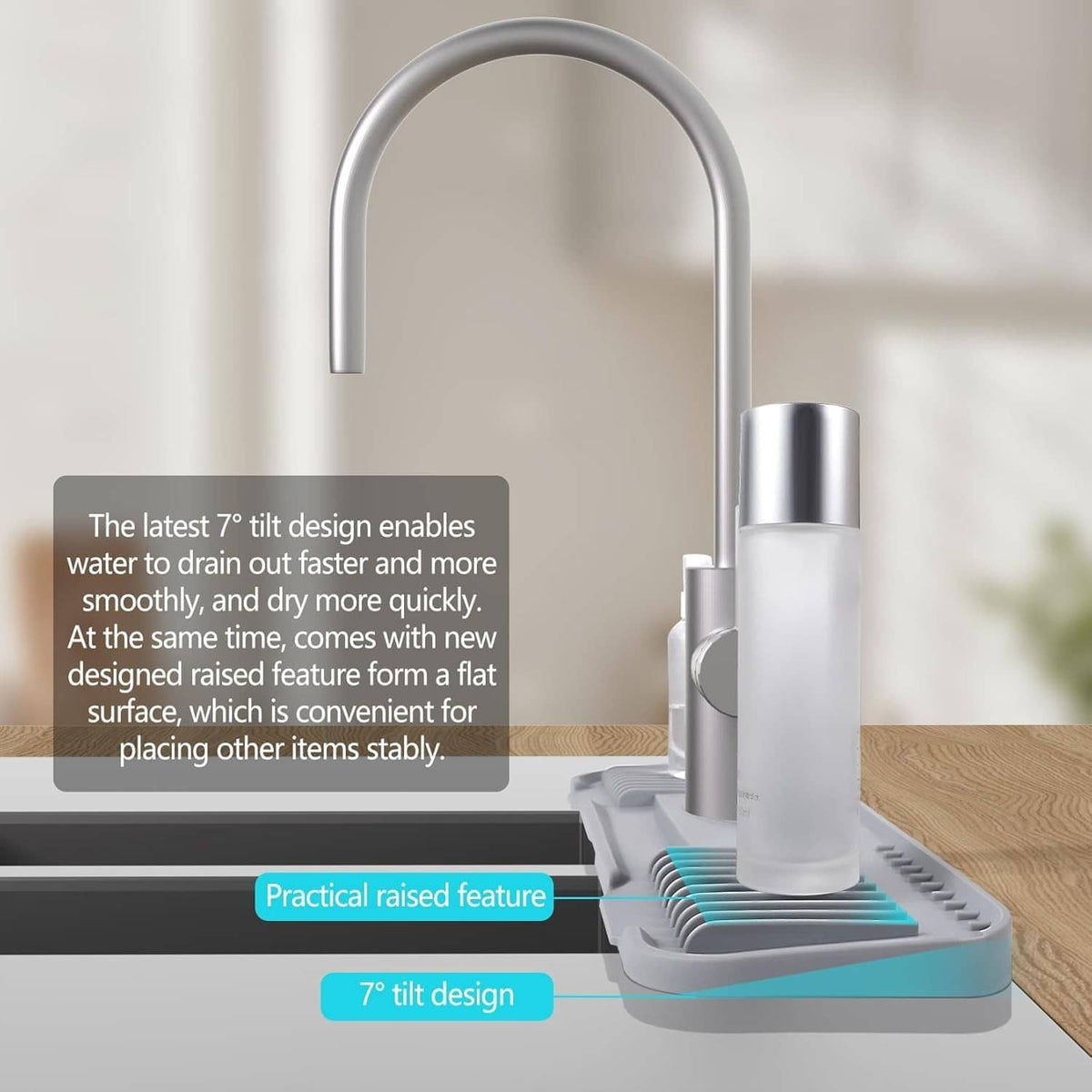 Light grey silicone faucet deck plate with tall spout and raised flat base on sink mat