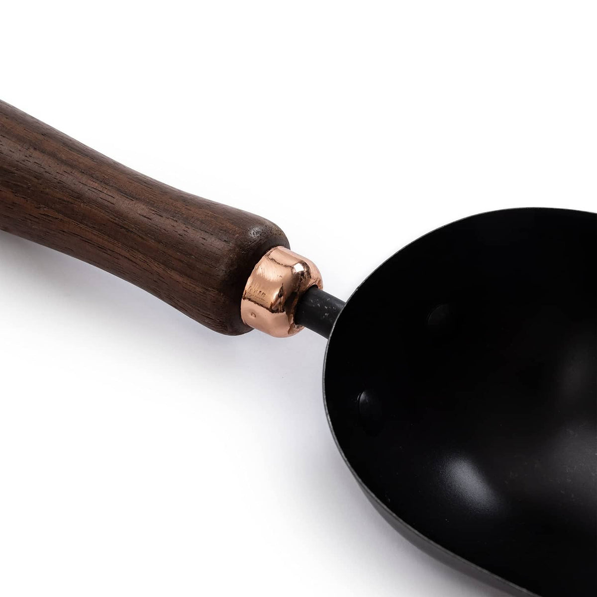 Garden shovel scoop with wooden handle and black blade, copper connector detail