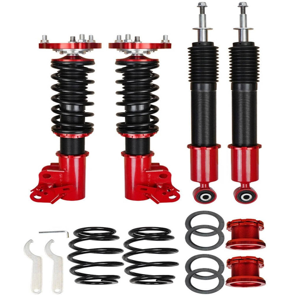 Complete coilover suspension kit with two spring struts, two shock struts, and springs