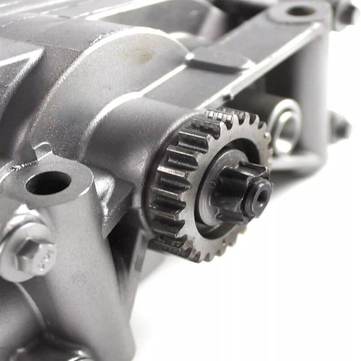 Engine shaft balance oil pump close-up of gear teeth and metal casting