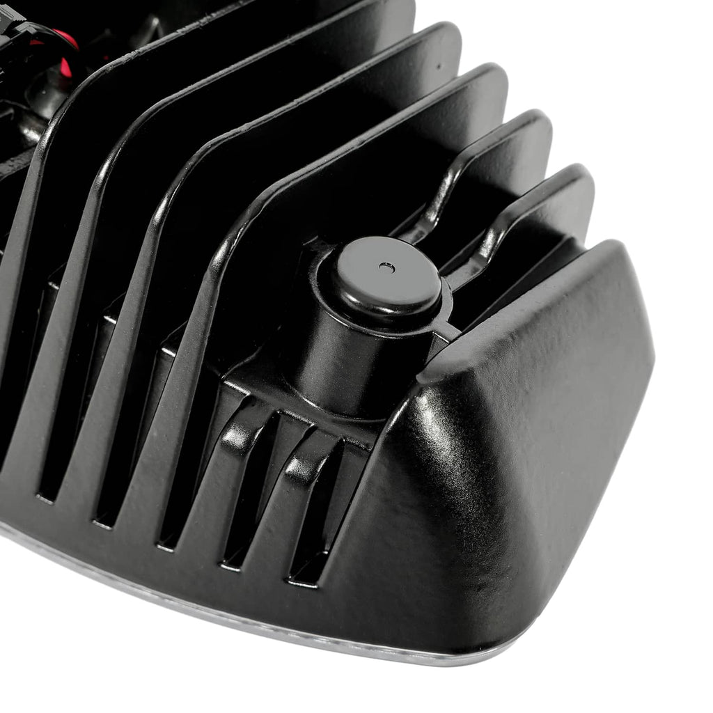 Cab roof marker light housing with circular cover and vented grille, black metal