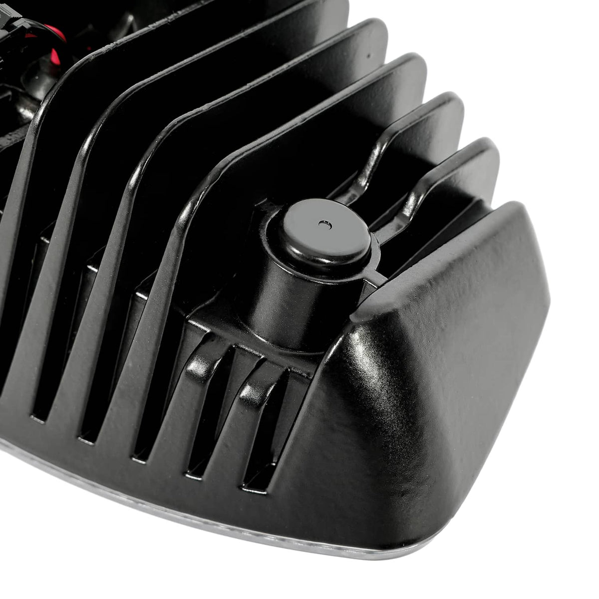 Cab roof marker light housing with circular cover and vented grille, black metal