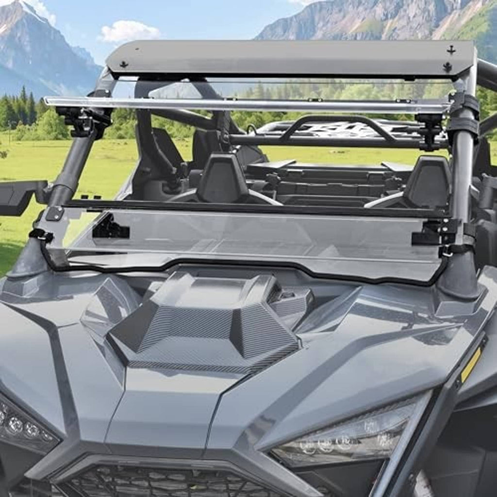 Flip-up windshield with clear visor panel and metal frame mounts for UTV protection