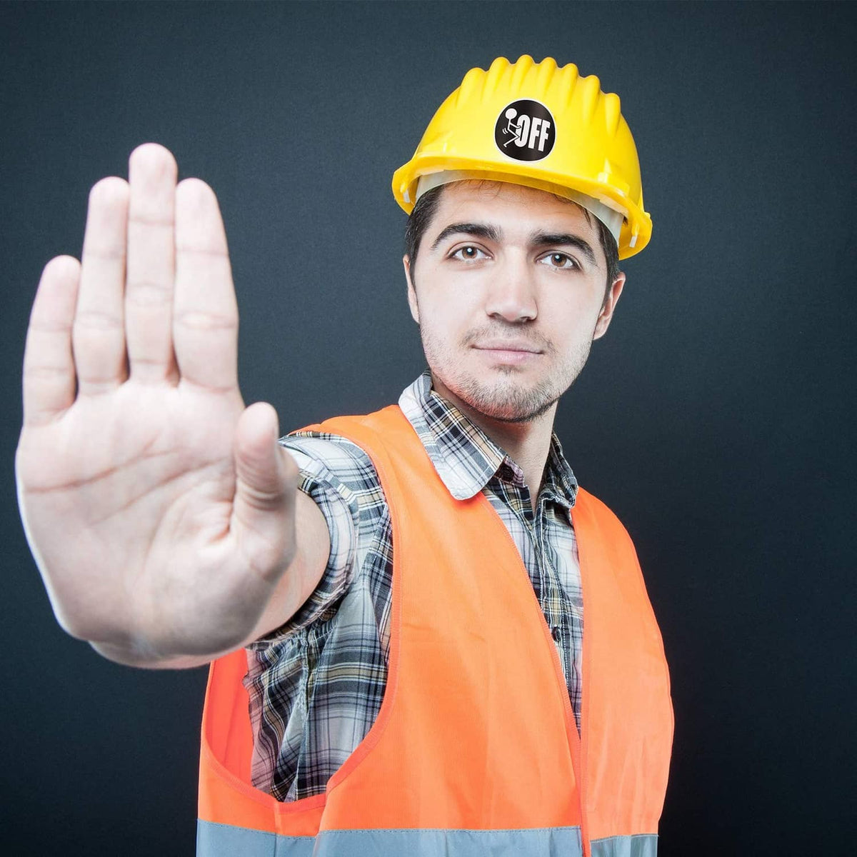 Yellow hard hat with round 'OFF' sticker