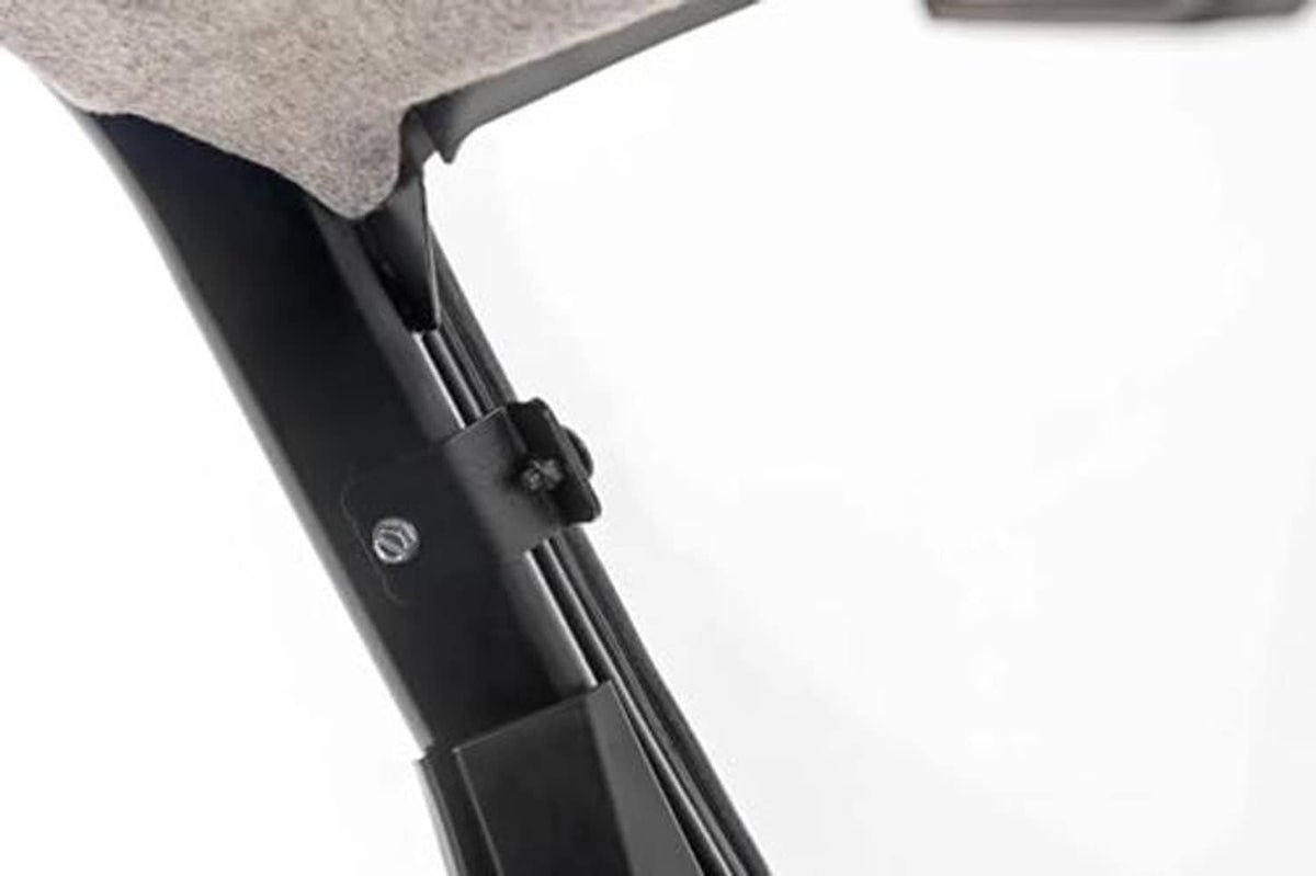 Black windshield support arm and mounting bracket with bolts