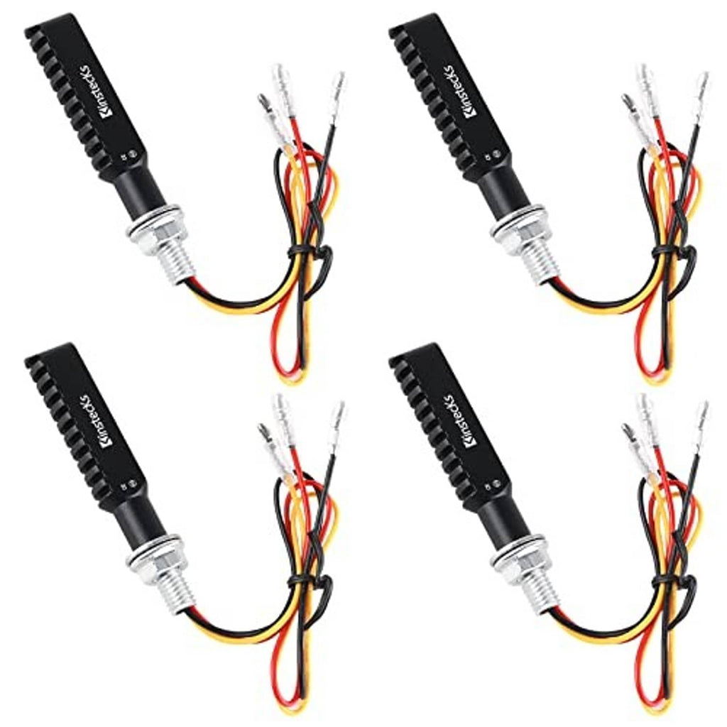 Set of four black motorcycle LED indicator lights with colored wire leads and plugs
