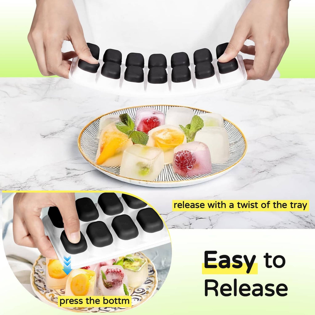 Ice cube tray holding black molds being twisted for easy cube release