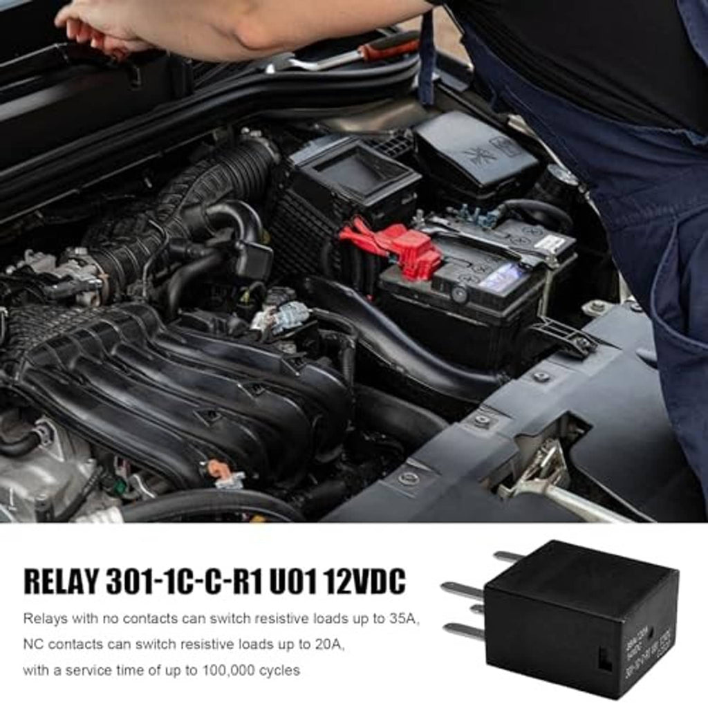 Automotive relay in a car engine bay, black housing with five pin leads