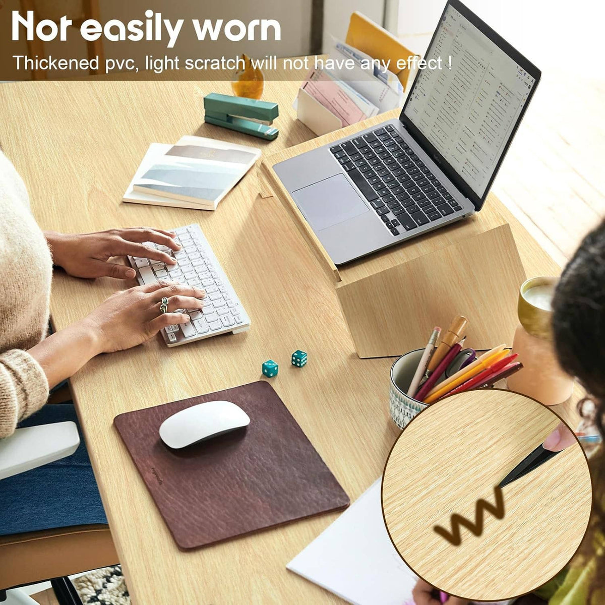 Light wood grain contact paper sheet on desk, beside keyboard and notebooks