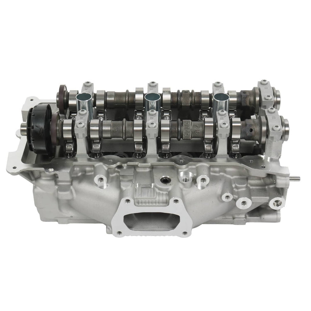 Cylinder head assembly side profile with cam lobes and ports, silver engine component