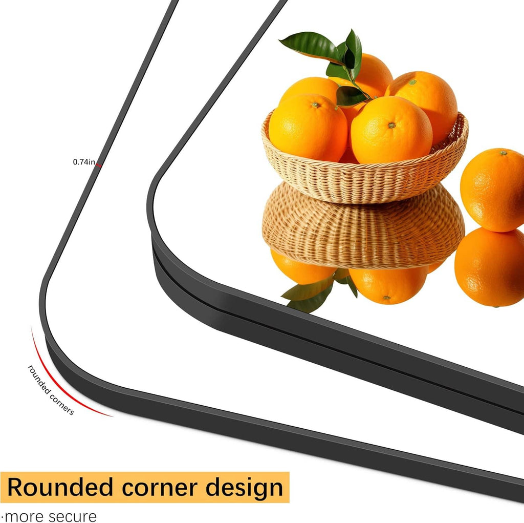 Rounded mirror edge detail with dark frame and corner protection label
