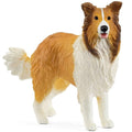 Realistic collie dog figurine with tan-and-white coat and white ruff