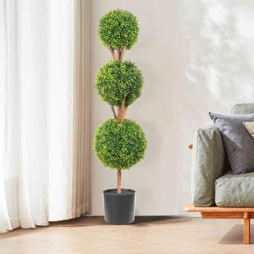 Artificial topiary tree with stacked round green foliage in black pot, indoor decor