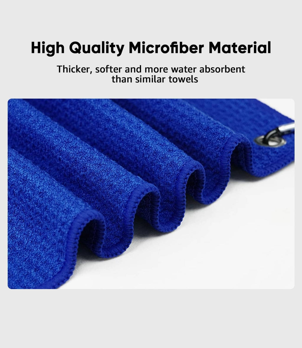 Close-up blue microfiber golf towel roll with carabiner clip, thick textured weave