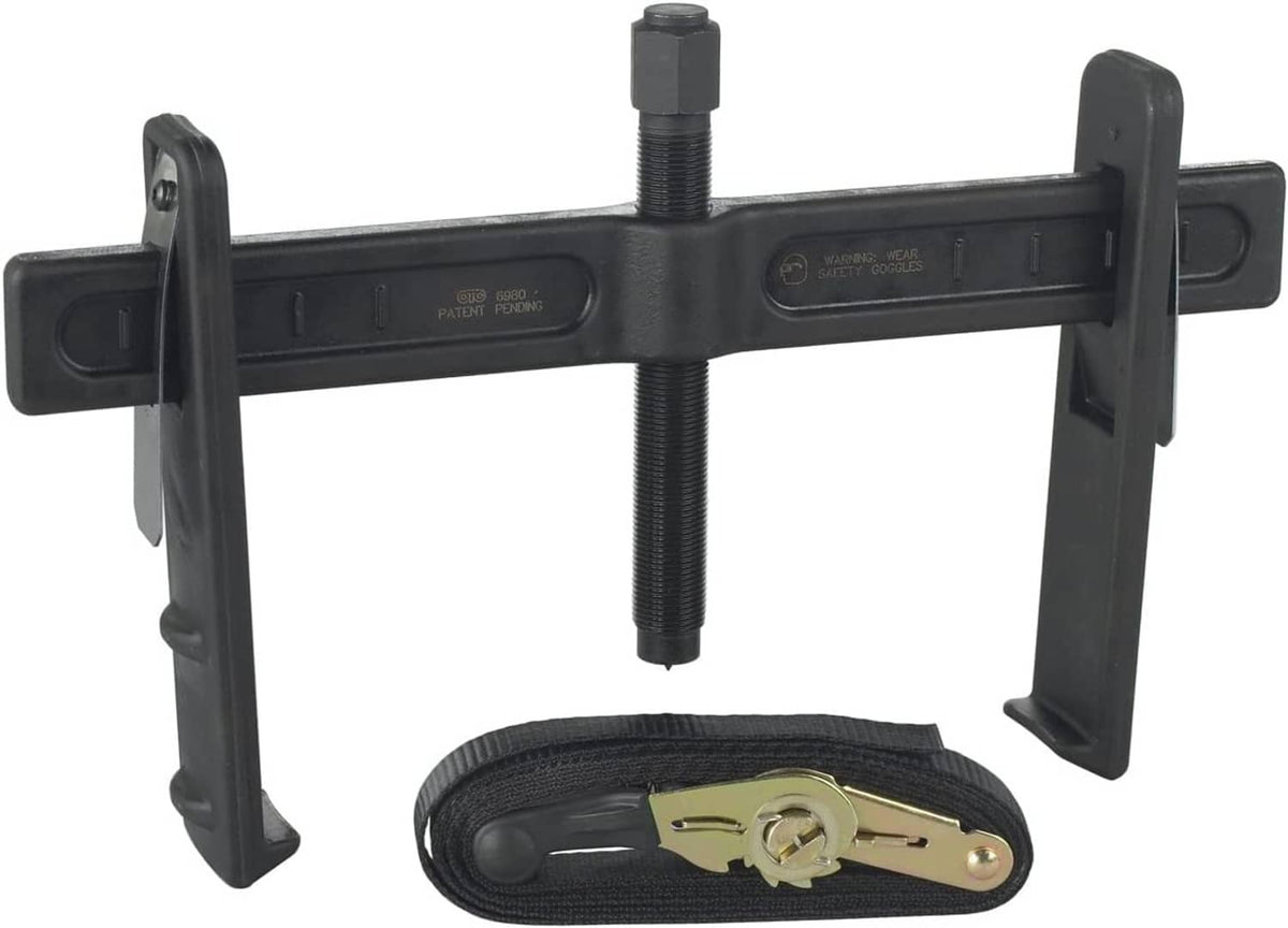 Brake drum and rotor puller tool with threaded center bolt and two fixed side brackets