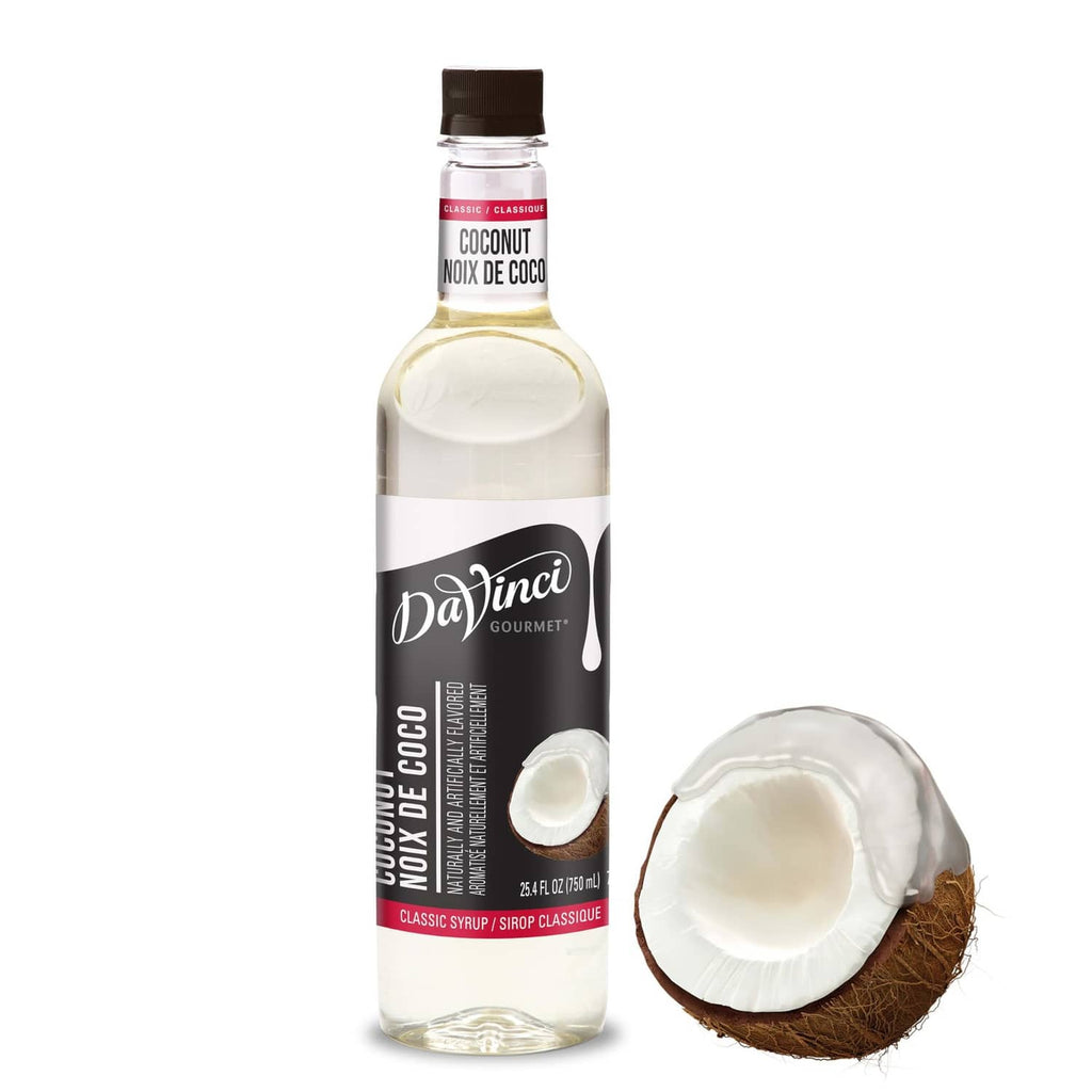 DaVinci coconut syrup bottle with cream-colored syrup and coconut half on side