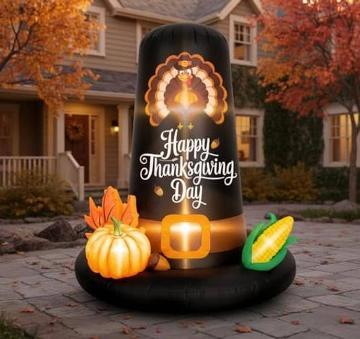Inflatable black pilgrim hat with LED-style base light, pumpkin and corn decoration