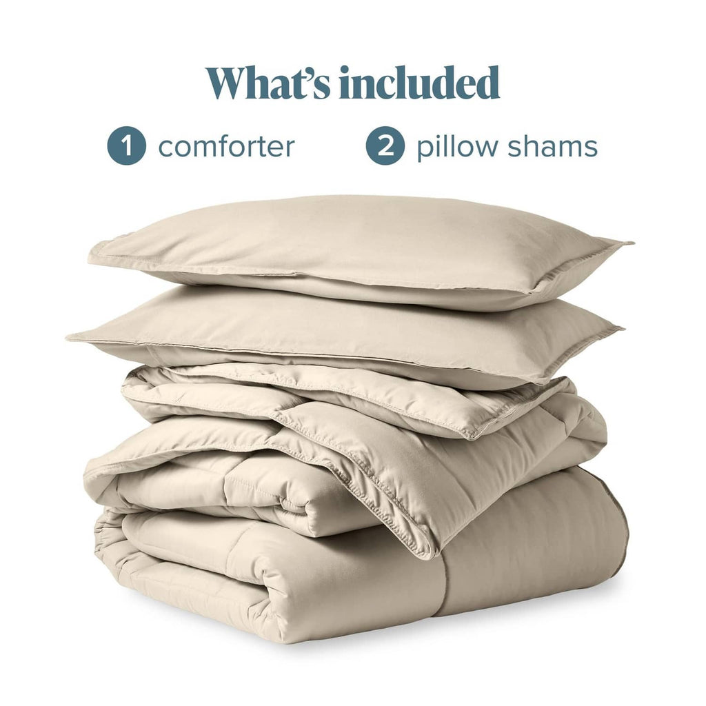 Stacked cream comforter with matching pillow shams, full size set contents