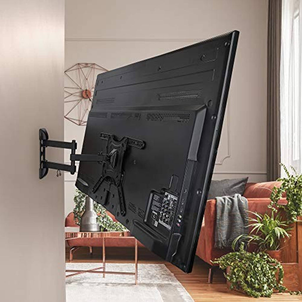 Black articulating TV wall mount holding a flat-screen TV on an indoor wall