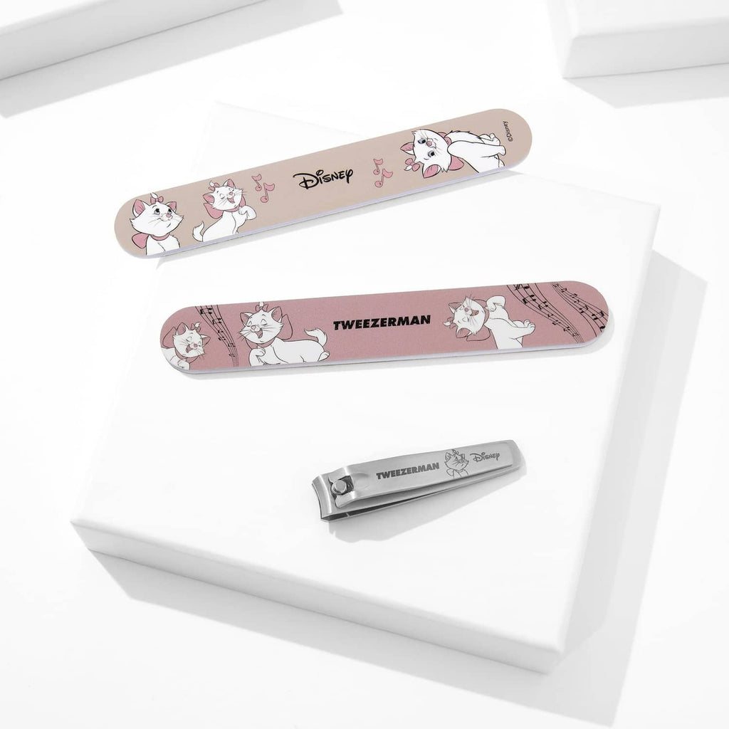 Manicure kit set with pink patterned case and Tweezerman nail clipper