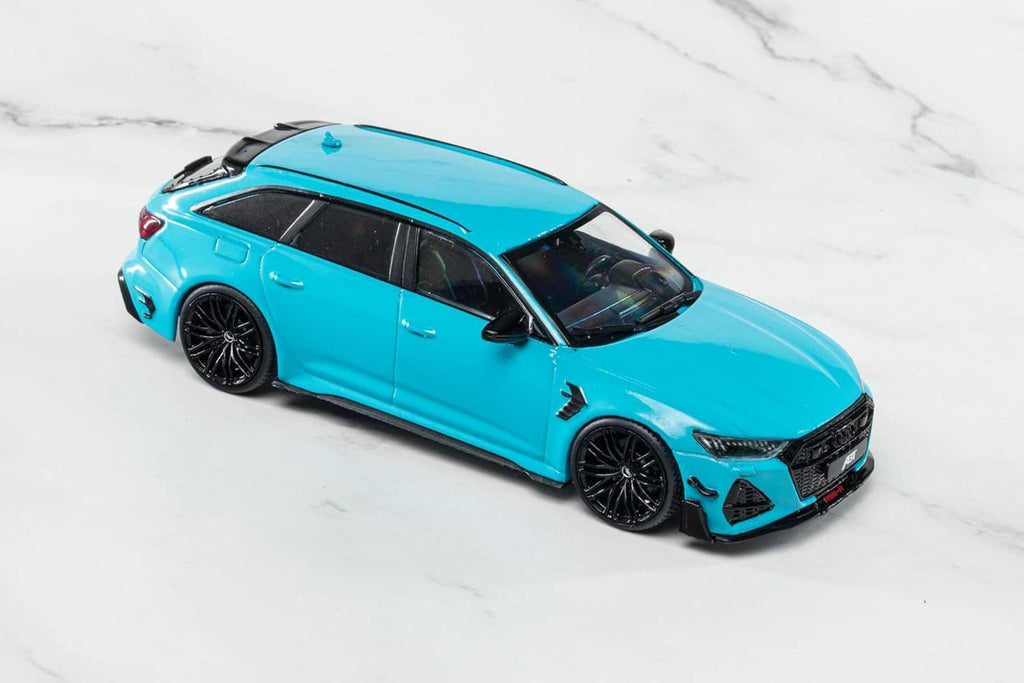 Blue ABT-tuned Audi RS6 die-cast model car, angled side view with black wheels