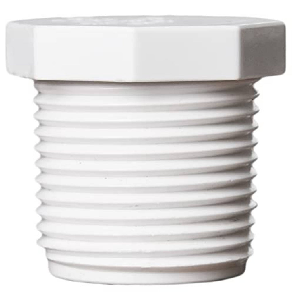 White PVC male threaded cleanout plug drain end cap, close-up of hex rim and threads
